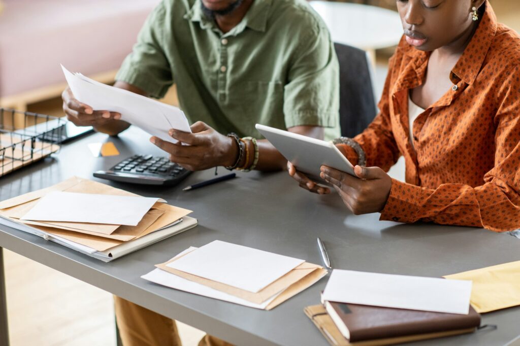 Couple Analyzing Month Costs